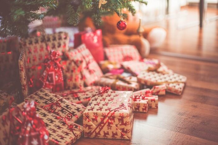 Secret Santa presents under tree